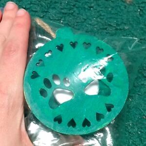 Light up green ornament with paws
